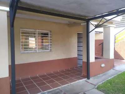 a screened in porch of a house at CastelAnte in Villa Carlos Paz