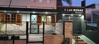 a house with a gate in front of it at La Rosas apartments in La Porteña
