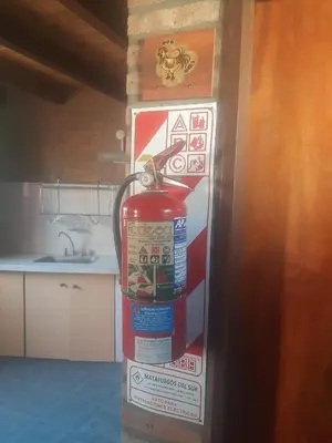 a fire hydrant in the corner of a kitchen at La casa de Milac in Mina Clavero