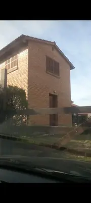 a house from a car view of a building at La casa de milac in Mina Clavero