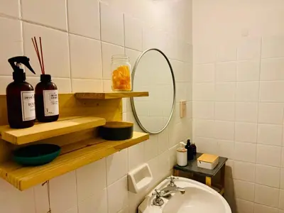 a bathroom with a sink and a mirror at Encantador departamento en Güemes in Cordoba