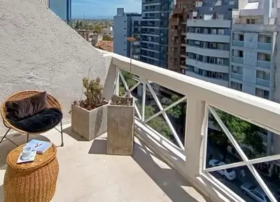 a balcony with a view of a city at Estudio en Nueva Córdoba in Cordoba