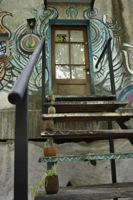 a building with a door and stairs with a window at NATURAL Tanti Lomas in Tanti