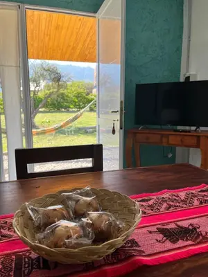 a basket of chickens sitting on top of a table at Cabañas La Chakana in Cortaderas