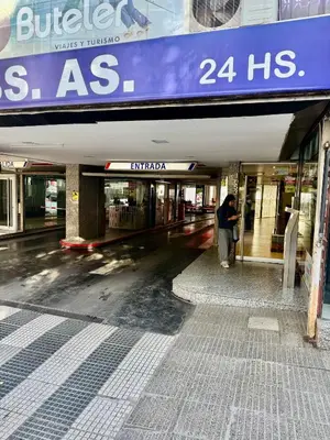 a man is standing outside of a building at Ayres de Córdoba 4, Asador, Terraza, Balcón, Excelente Ubicación in Cordoba
