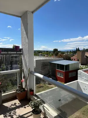 a view of a train from a balcony at Casa de Mary in Villa Carlos Paz