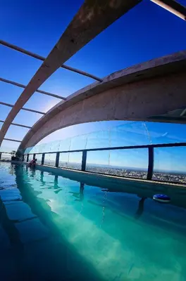 a bridge over a body of water at Alto Paz Tower Departamentos Premium in Cordoba