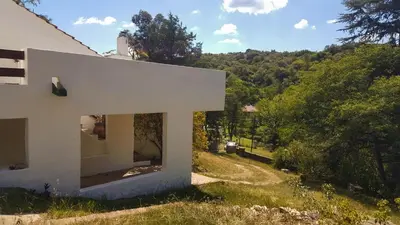 a white house with a view of a hill at Mountain house in Costa Blanca in Cuesta Blanca