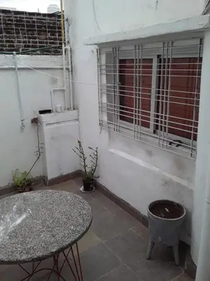 a room with a table and a window at El Dpto de Gabicito V in Cordoba