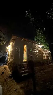 a house is lit up at night at Tierra de Arroyo, Mallin-Tanti in Tanti
