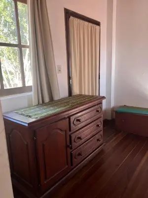 a dresser with a mirror on top of it in a room at Casita de campo in Villa Ciudad Parque