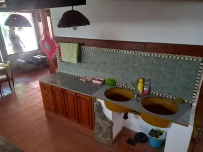 a bathroom with two sinks and a counter at Casa Amueblada en Las Albahacas in Piedras Blancas