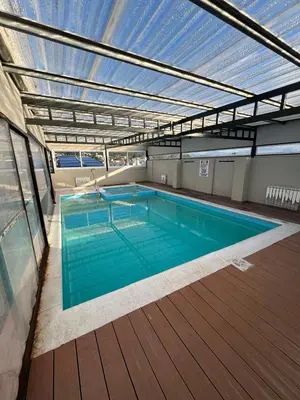 a large swimming pool on the deck of a boat at Luz del Lago in Villa Carlos Paz