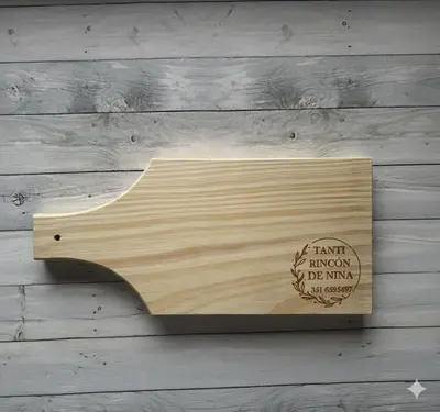 a wooden cutting board on a wooden table at Rincón de Nina in Tanti