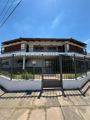 a building with a gate in front of it at La Casa de la Colina in Cordoba