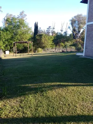 a large grassy field with a soccer goal at Tanti casita del rio in Tanti Nuevo