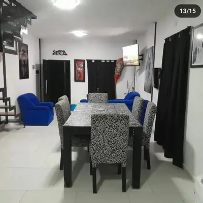 a dining room with a table and chairs at Doña LoIa in San Roque