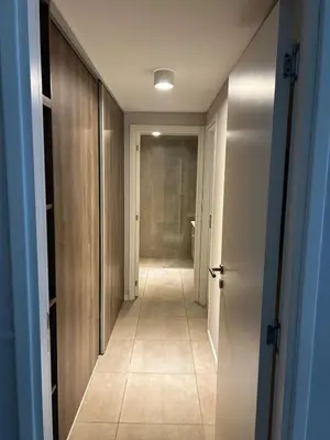 a corridor of a hallway with at Departamento Premium con Pileta en Altura in Cordoba