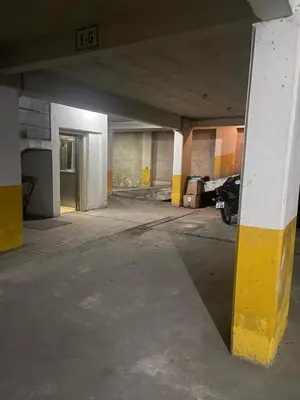 an empty parking garage with a parking lot at depto a 1 cuadra de peatonal, luminoso con pile y cochera in Villa Carlos Paz
