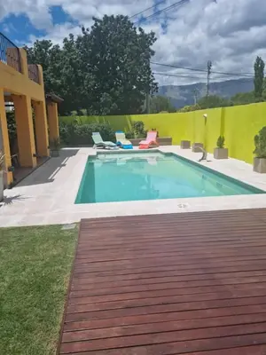 a swimming pool in the backyard of a house at Casa en Nono para 6 personas in Nono