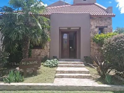 a small house with a sign in front of it at Casa en Nono para 6 personas in Nono