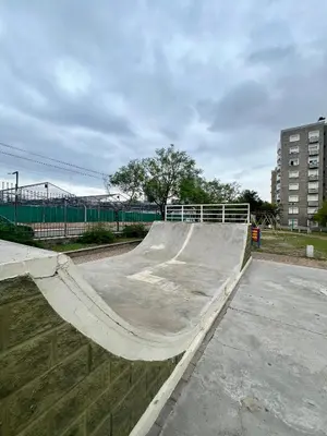 a skate park with a skateboard ramp in a parking lot at Departamento para dos personas VILLA SOL in Cordoba