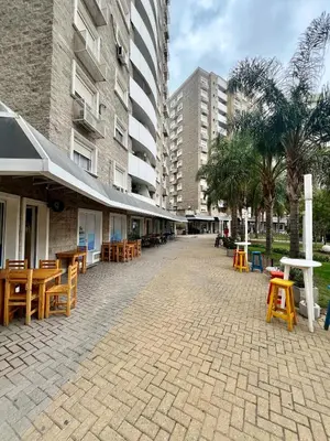 an empty street with tables and chairs and buildings at Departamento para dos personas VILLA SOL in Cordoba