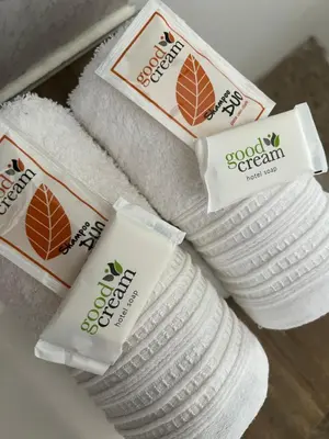 a pile of towels and a pile of paper towels at Depto 168 in Santa Rosa de Calamuchita