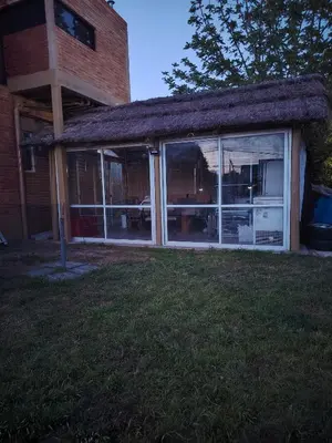 a screened in porch of a house at Panorámica Sierras in Villa Carlos Paz