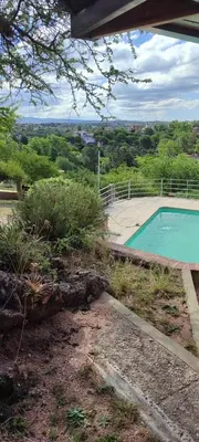 a view of a swimming pool from a house at CASA QUINTA en ESTANCIA VIEJA in Villa Carlos Paz