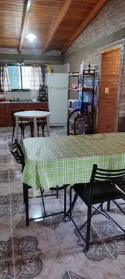 a room with a table with a table cloth on it at CASA QUINTA en ESTANCIA VIEJA in Villa Carlos Paz