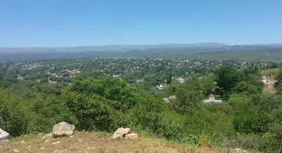 a view of a city from the top of a hill at Complejo Monarcas in Villa Carlos Paz