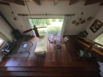 an overhead view of a living room with a table at Casa Familiar in La Cumbrecita