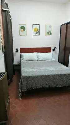 a bedroom with a bed in a room at Grivia in Cordoba