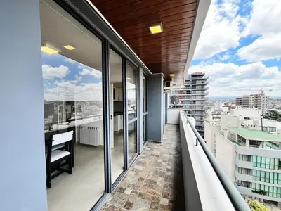 a balcony with a view of a city at Victoria Tower Category Department in Villa Carlos Paz