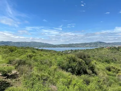 a view of a body of water from a hill at El Descanso in Villa Santa Cruz del Lago