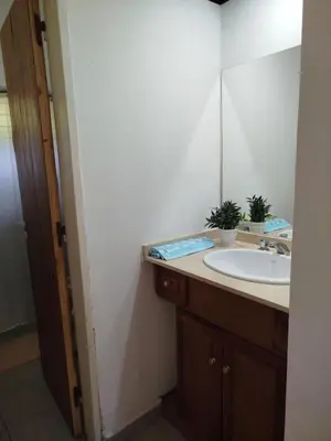 a bathroom with a sink and a mirror at DonPedro in Los Hornillos