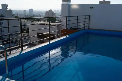 a swimming pool on the roof of a building at Casacalma in Cordoba