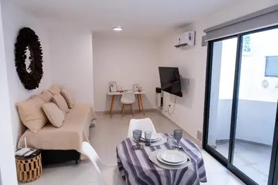 a living room with a couch and a table at Casacalma in Cordoba