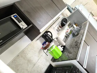 an overhead view of a kitchen with a counter top at HOUSING- Vistas a las sierras-Departamento temporario amoblado in Cordoba