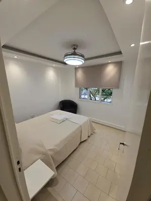 a bedroom with a bed and a window at Departamento en Bv San Juan a cuadras del shopping Patio Olmos in Cordoba