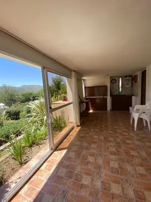 a large room with a large window with a view at Elena in San Antonio de Arredondo
