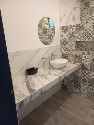 a bathroom with a sink and a mirror at La Casa del Mirador in Santa Rosa de Calamuchita