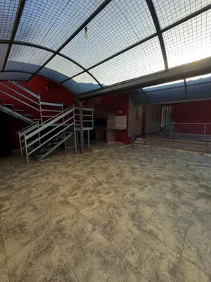 an empty room with stairs and a ceiling at Pepina Mina Clavero in Mina Clavero