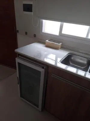a kitchen with a sink and a counter top at Selene in Villa Rumipal