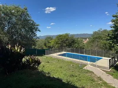 a swimming pool with a fence around it at Casa Villa Santa Cruz del Lago in Villa Santa Cruz del Lago