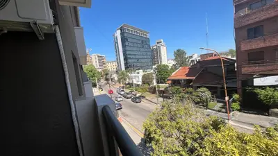 a view from a window of a city street at Departamento Orlando, zona centro in Villa Carlos Paz
