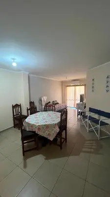 a room with two tables and chairs and a room with a table at Departamento Orlando, zona centro in Villa Carlos Paz