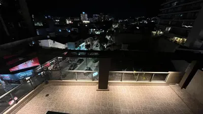 a view from the top of a building at night at Departamento Orlando, zona centro in Villa Carlos Paz