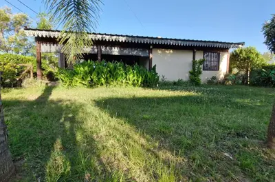 a house in the middle of a yard at Casa Runa Kay in Almafuerte